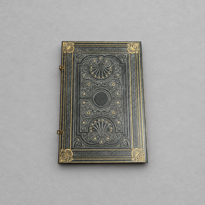 Impish Greetings Paperblanks Nocturnelle grande hardcover journal with ornate black faux leather and gold detailing.