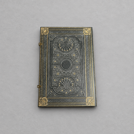Impish Greetings Paperblanks Nocturnelle grande hardcover journal with ornate black faux leather and gold detailing.