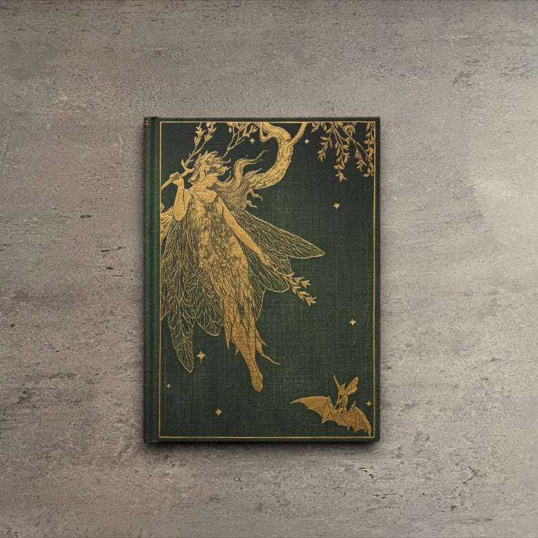 Impish Greetings Paperblanks Olive Fairy hardcover journal with ornate gold foil fairy illustration on green fabric