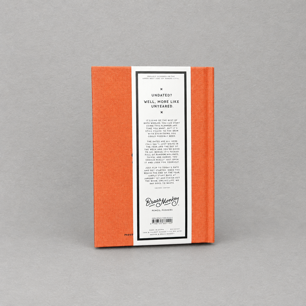 Impish Greetings Part-Time Adult undated planner featuring an orange cloth-bound cover with back cover text details.
