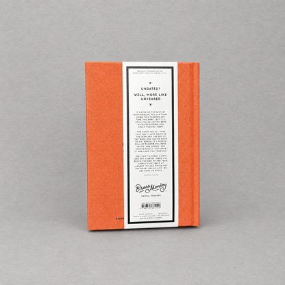 Impish Greetings Part-Time Adult undated planner featuring an orange cloth-bound cover with back cover text details.