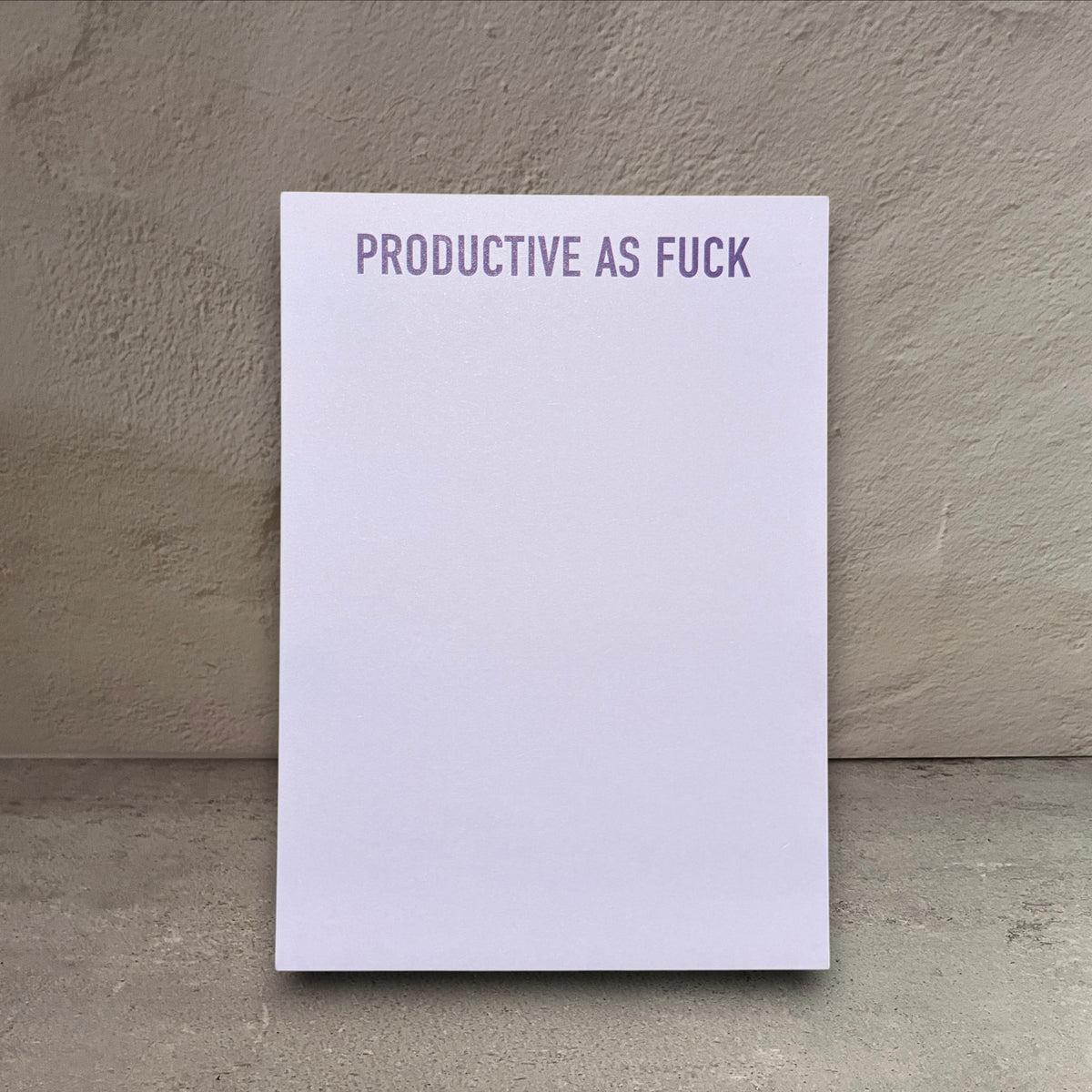 Impish Greetings Productive As Fuck notepad with purple text on a white background, 5x7 tear-off stationery.