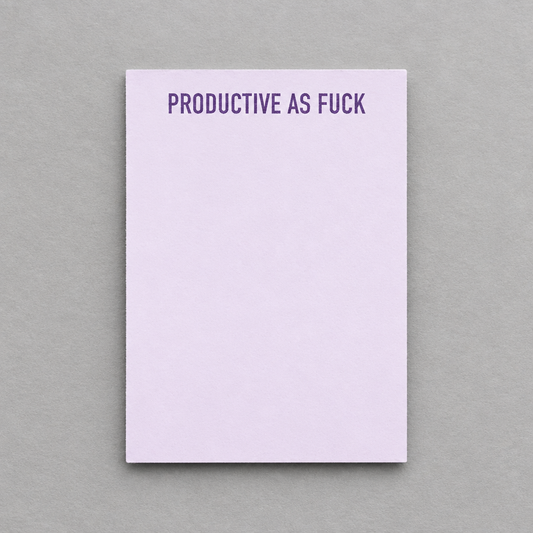 Impish Greetings Productive As Fuck notepad with purple text on a light lavender paper sheet