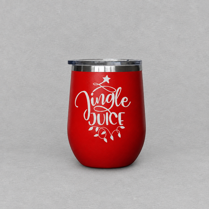 Impish Greetings red metal Jingle Juice Christmas tumbler with a clear plastic lid and laser engraved festive design.