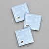 Impish Greetings light blue square Post-it notes featuring a white skull and bone border design on a grey background.