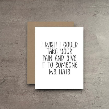 Impish Greetings sympathy card with black text on white matte cardstock and a kraft envelope on a grey background.