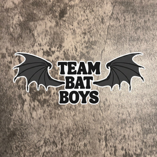 Impish Greetings Team Bat Boys clear vinyl sticker featuring black bat wings and bold white text on a textured background