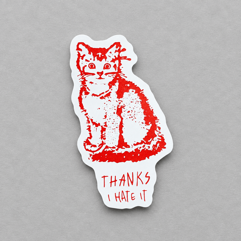 Impish Greetings vinyl sticker featuring a red cat illustration and the text Thanks I Hate It on a grey background.