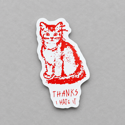 Impish Greetings vinyl sticker featuring a red cat illustration and the text Thanks I Hate It on a grey background.