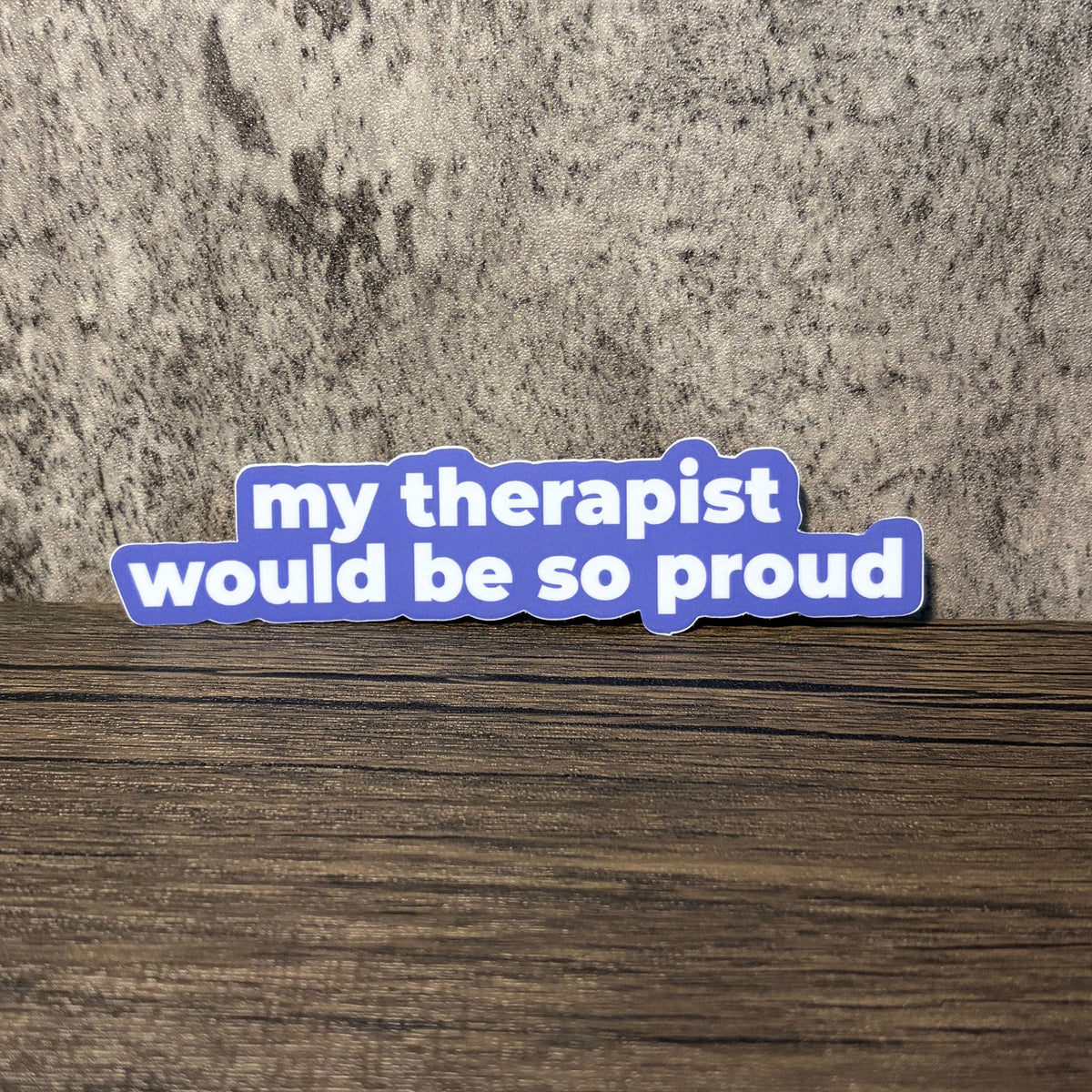 Impish Greetings My Therapist Would Be So Proud die-cut vinyl sticker with white text on a purple background.
