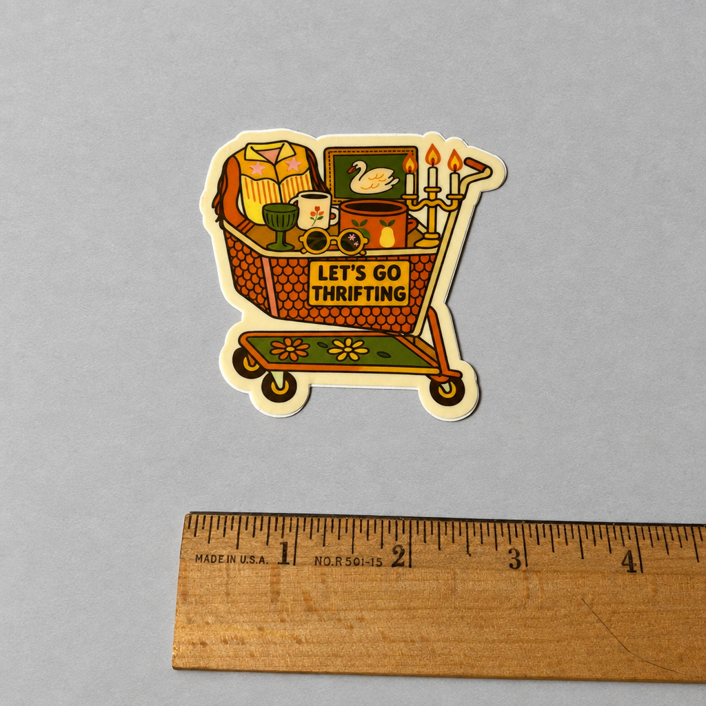 Impish Greetings Let's Go Thrifting sticker featuring a vintage shopping cart filled with thrifted treasures