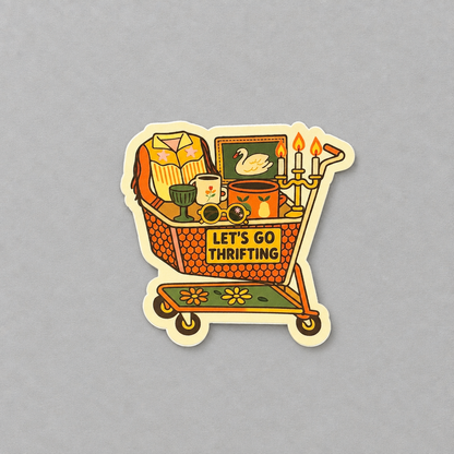 Impish Greetings Let's Go Thrifting vinyl sticker featuring a retro shopping cart filled with vintage treasures.