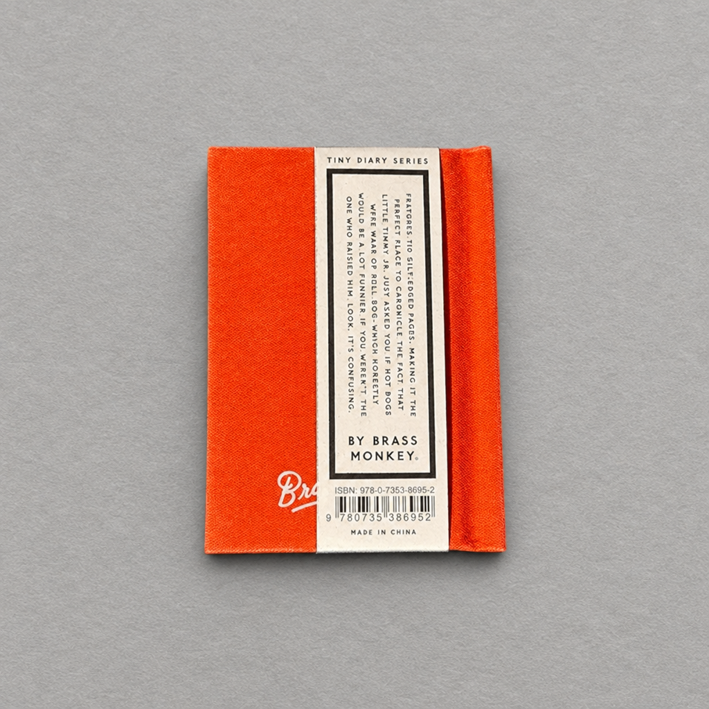 Impish Greetings Dumb Things My Kid Said tiny hard-bound felt diary with orange cover and gold-edged pages