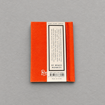 Impish Greetings Dumb Things My Kid Said tiny hard-bound felt diary with orange cover and gold-edged pages