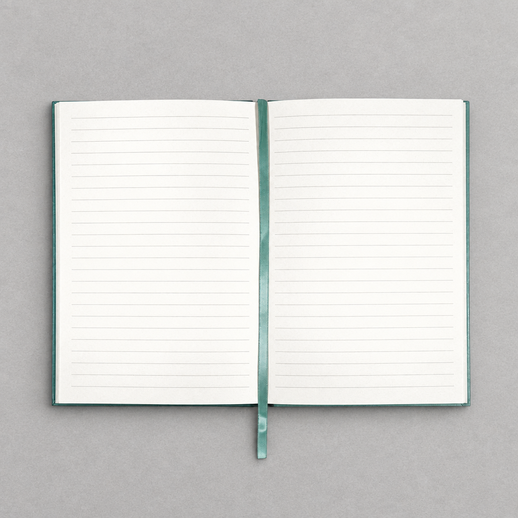 Impish Greetings A5 vintage notebook open to ivory lined pages with a matching teal ribbon bookmark