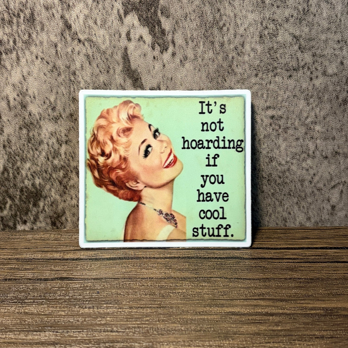 Impish Greetings vinyl sticker featuring a vintage-style woman and the text It's Not Hoarding If You Have Cool Stuff