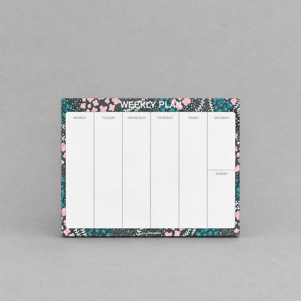 Impish Greetings Weekly Plan notepad with floral border on eco-friendly paper for organizing weekly schedules.