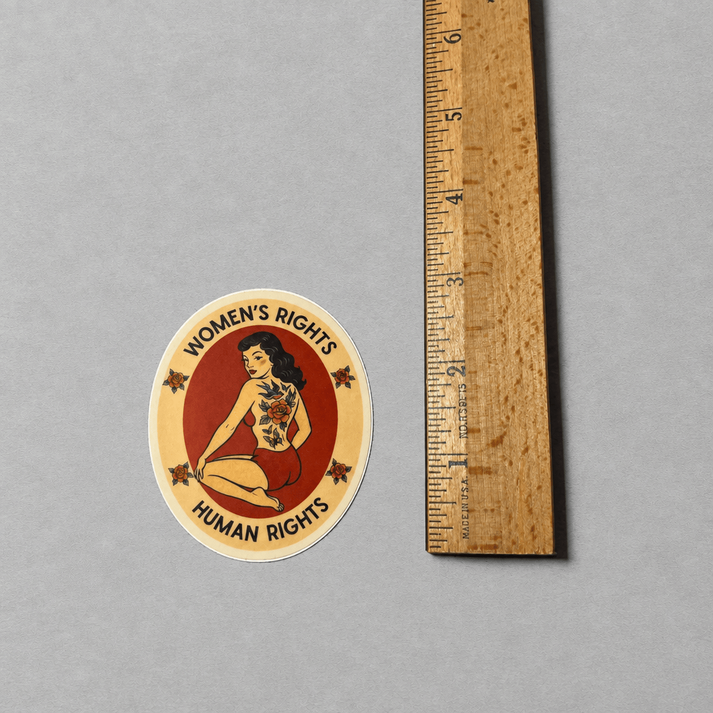 Impish Greetings Women's Rights sticker featuring a vintage pin-up illustration with floral tattoos on a cream oval.