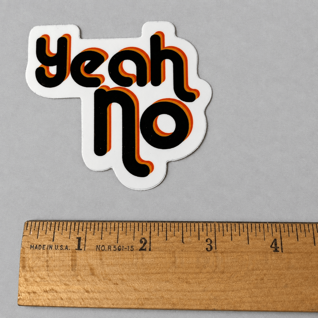Impish Greetings Yeah No glossy sticker with retro black, orange, and yellow typography on a grey background.