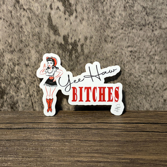 Impish Greetings Yee Haw Bitches sticker featuring a pin-up cowgirl illustration in red and black on a white background