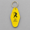 Impish Greetings yellow vintage-style motel key fob featuring a Ponyboy silhouette and Stay gold Ponyboy text.