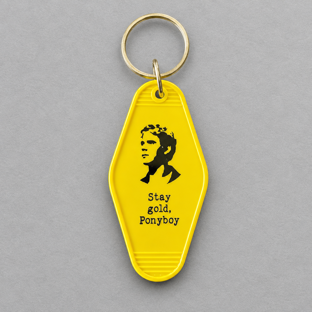 Impish Greetings yellow vintage-style motel key fob featuring a Ponyboy silhouette and Stay gold Ponyboy text.