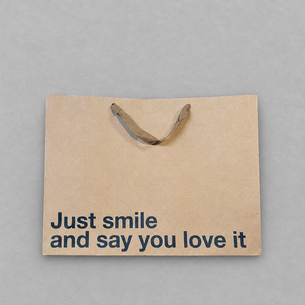 Just Smile and Say You Love It Large Gift Bag photo 1 on the lighter grey backdrop