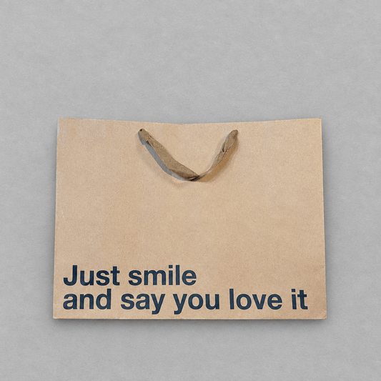 Just Smile and Say You Love It Large Gift Bag photo 1 on the lighter grey backdrop