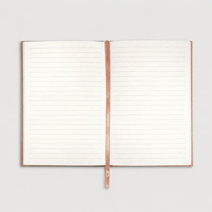 Notebook pages on muted light grey