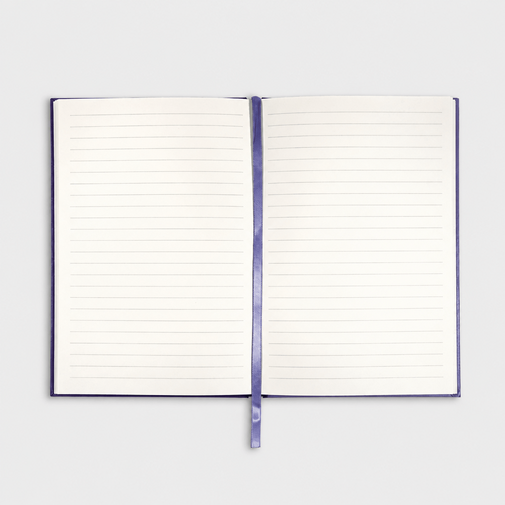 Open notebook on muted light-grey background