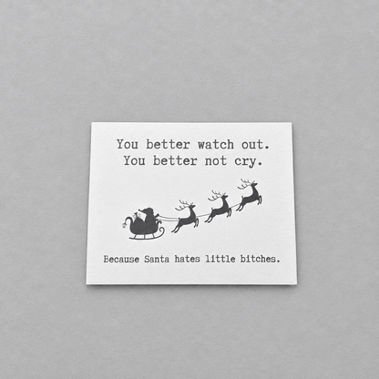 Santa Hates Little B*tches Christmas Card photo 1 on the lighter grey backdrop