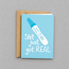 Shit Just Got Real Pregnancy Card photo 1 on the lighter grey backdrop