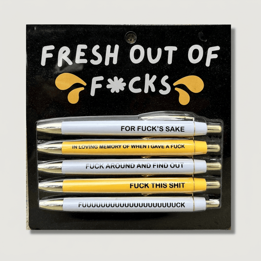 Straight-on pen set on a muted light-grey background