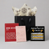 Work Bestie with unbranded ribbon-handle bag