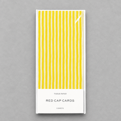 Yellow Stripe Tissue Paper photo 1 on the lighter grey backdrop