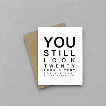 You Still Look Twenty From A Distance Birthday Card photo 1 on the lighter grey backdrop